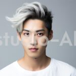 最新トレンドヘアスタイルをした男性の真顔ショット