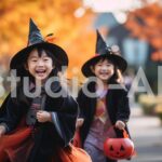 ハロウィンに魔女コスプレをする若い女性