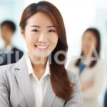 社内で働く会社員の人たちと新人の若い女性社員