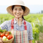 野菜を収穫した3人の女の子